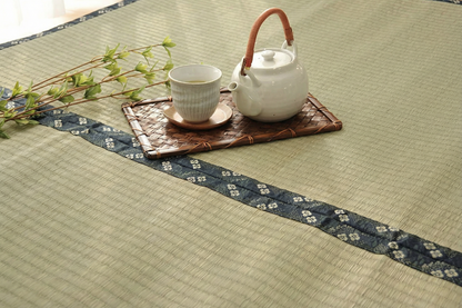 Close-up of Baika tatami mat showing plum blossom weave detail