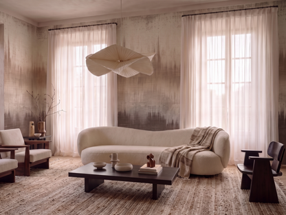 Hibiki Horizon Japandi mural wallpaper, woven dusk-toned gradient from cream to charcoal on a living room wall