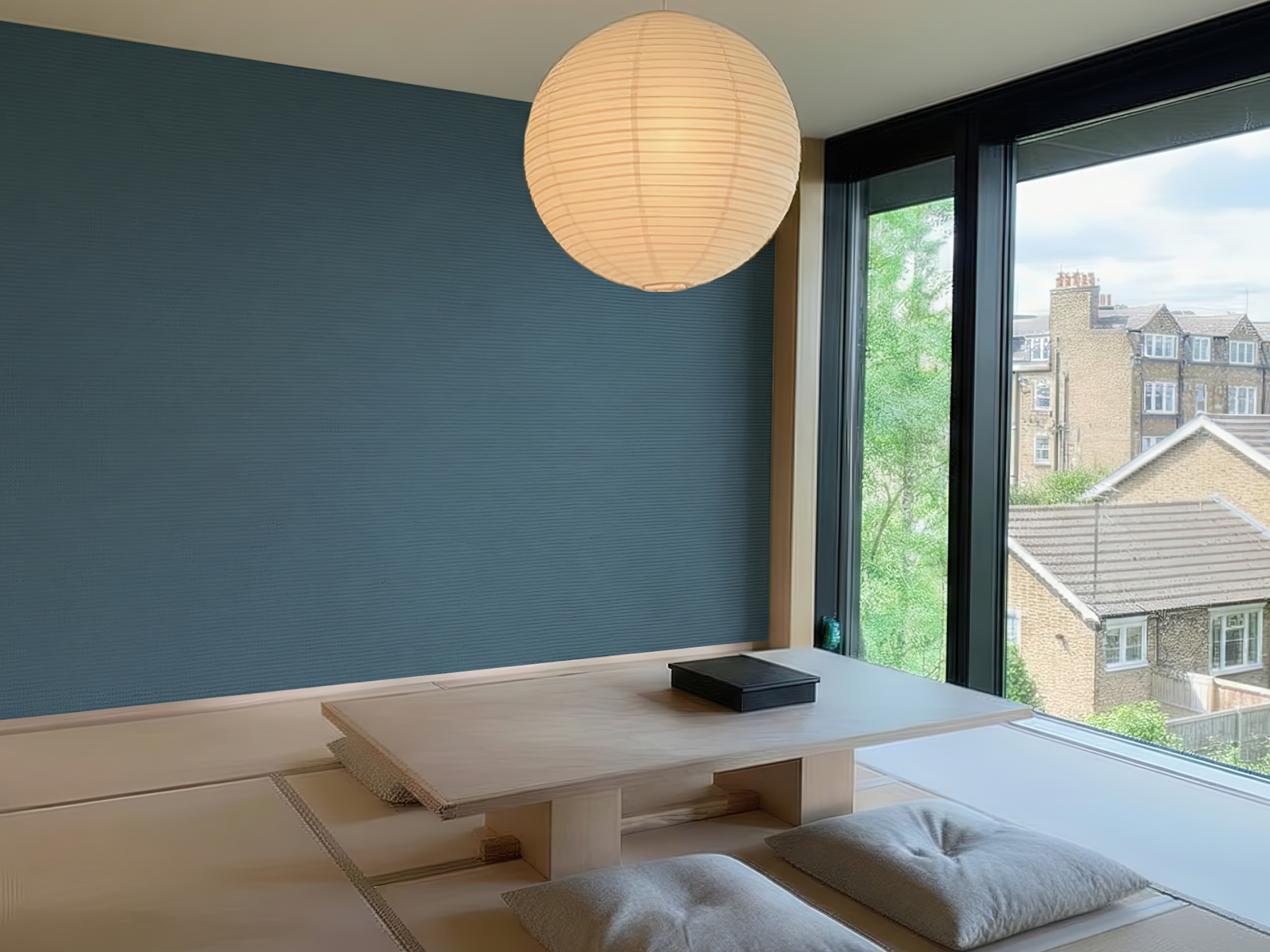 Masuhanairo Japandi quiet colour wallpaper, soft indigo-leaning blue hue on a living room wall